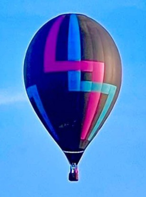 Hot air balloon named Unchained Remix, flown by Jonathan Wright at the National Balloon Classic.